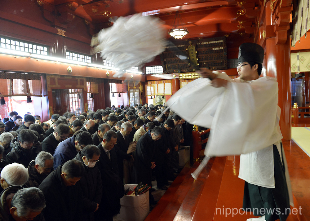 Japanese businessmen praying for thriving business at Tokyo's Kanda Myojin