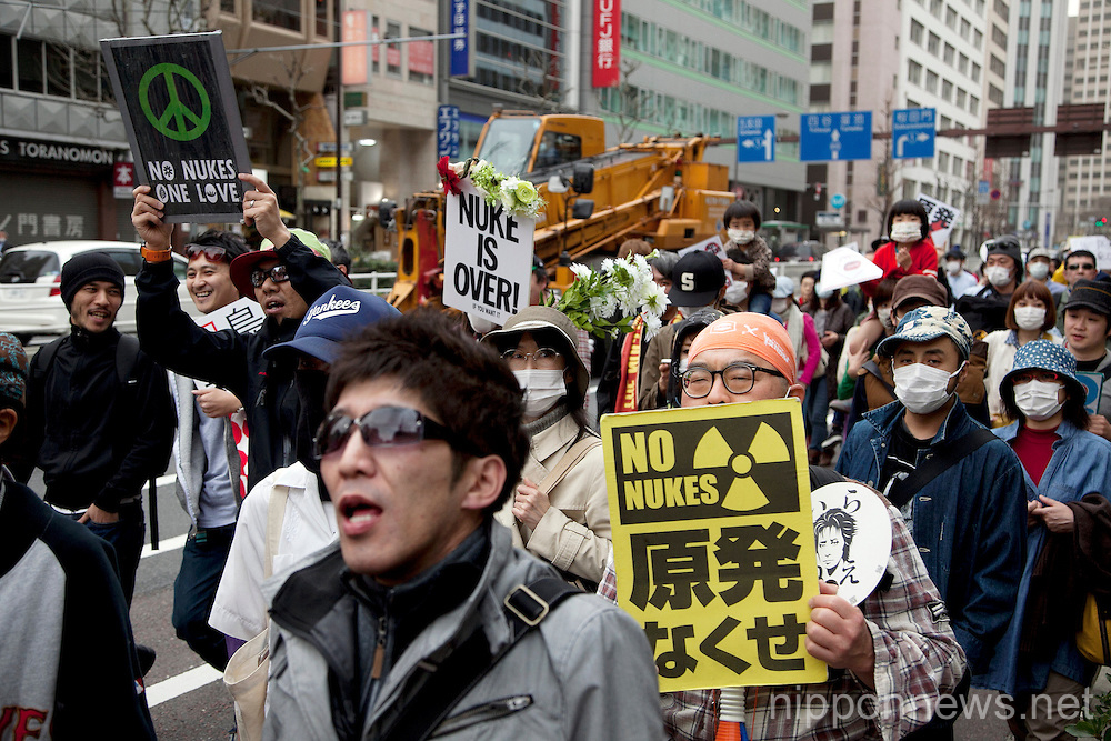 Anti-nuclear protesters march in Tokyo two years after Great Earthquake