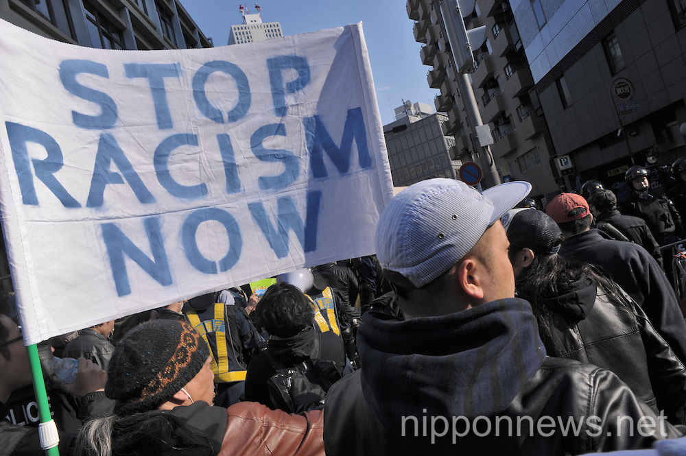 Anti-racist demonstrate against far right march in Tokyo