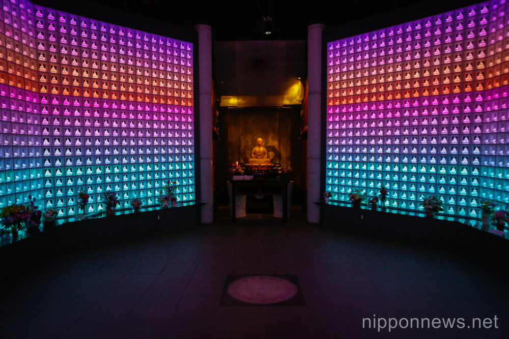 High tech Tokyo cemetry uses crystal LED Buddha statues