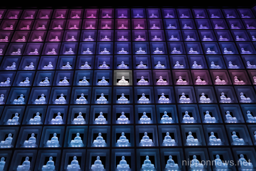 High tech Tokyo cemetry uses crystal LED Buddha statues