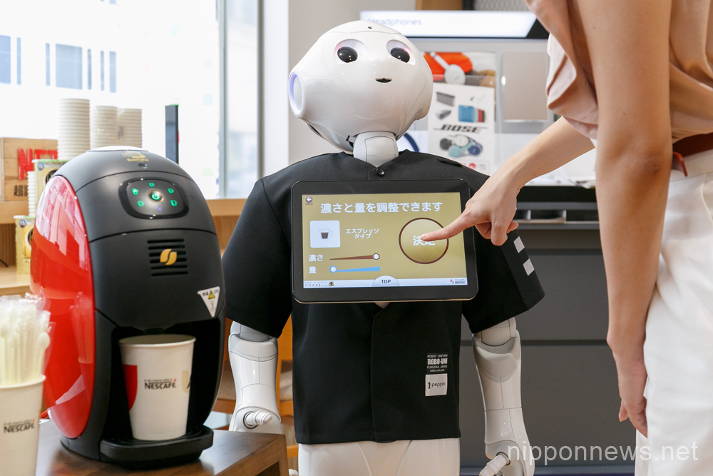 Robot Pepper starts to work serving coffee at SoftBank store