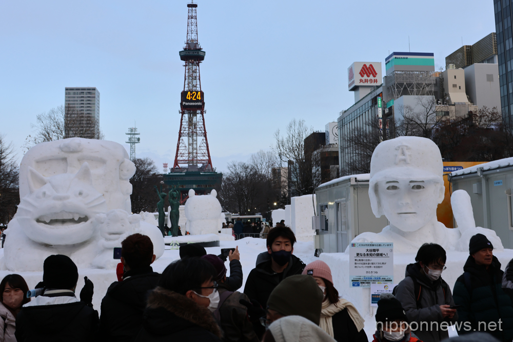 73rd Sapporo Snow Festival, February 11, 2023 - The Sapporo Snow Festival opens for the first time since 2020. Following the cancelation of the event in 2021 and 2022, organizers decided to have a scaled down festival for 2023. The snow festival is held annually for one week in early February at Odori Park showcasing snow and ice sculptures. This year's snow festival, commemorates the 100th anniversary of the City of Sapporo. (Photo by AFLO)