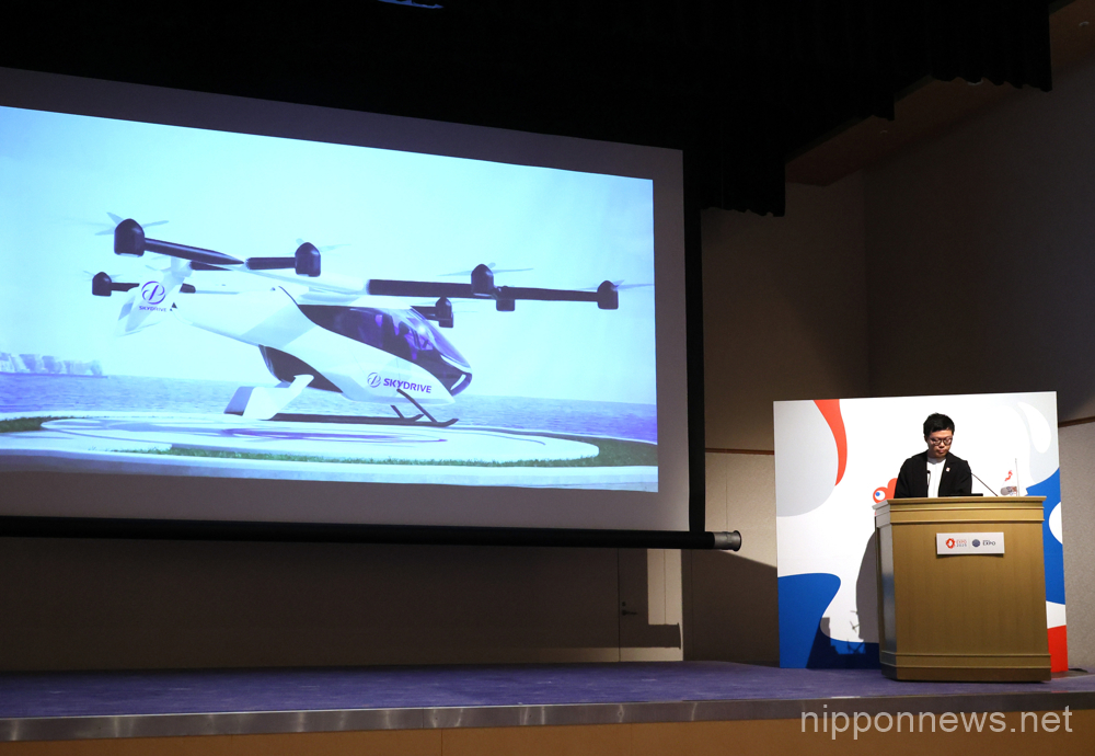 February 21, 2023, Tokyo, Japan - Japan's flying vehicle venture SkyDrive president Tomohiro Fukuzawa speaks as the company was selected for a company to participate the Smart Mobility Expo at the Expo 2025 Osaka, Kansai at a presentation in Tokyo on Tuesday, February 21, 2023. SkyDrive and other three companies will operate flying vehicles (eVTOLs) between the Expo site and airports/Osaka city in 2025. (photo by Yoshio Tsunoda/AFLO)