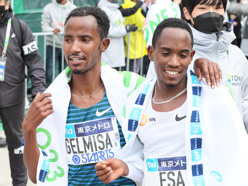 March 5, 2023, Tokyo, Japan - Ethiopia's Deso Gelmisa (L) smiles with his compatriot Mohamed Esa (R) after they finished the Tokyo Marathon in Tokyo on Sunday, March 5, 2023. Gelmisa won the race with a time of 2 hours 5 minutes 22 seconds while Esa finished with the same time. (Photo by Yoshio Tsunoda/AFLO)