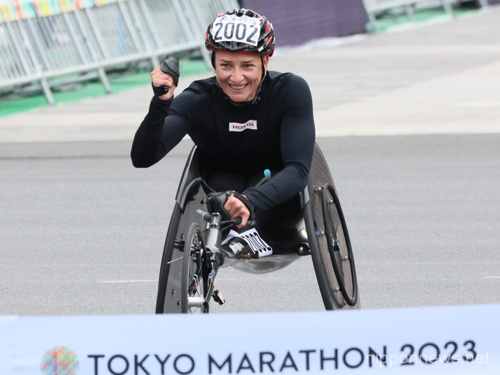 March 5, 2023, Tokyo, Japan - Manuela Schar of Switzerland crosses the finish line of the Tokyo Marathon in Tokyo on Sunday, March 5, 2023. Schar won the women's wheelchair race with a time of 1 hours 36 minutes 43 seconds while Ethiopia's Deso Gelmisa won the race. (Photo by Yoshio Tsunoda/AFLO)