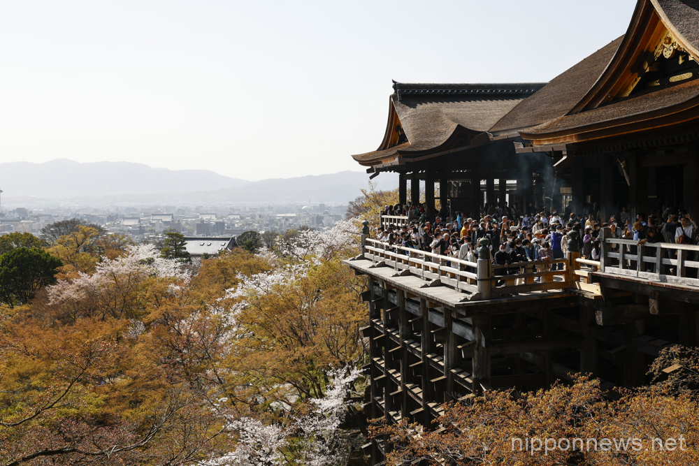 People gather to see the cherry blossoms in full bloom at Kiyomizu Temple on March 29, 2023, in Kyoto, Japan. The cherry blossom season started officially on March 24 in Kyoto, six days earlies thank usual. (Photo by Rodrigo Reyes Marin/AFLO)