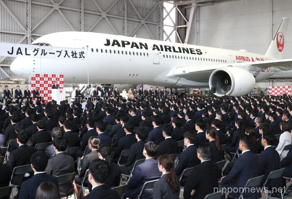 April 3, 2023, Tokyo, Japan - Japan Airlines (JAL) president Yuji Akasaka delivers a speech before newly hired employees at JAL's entrance ceremony at a JAL hangar of Haneda Airport in Tokyo on Monday, April 3, 2023. JAL group hired 2,000 new employees this year. (photo by Yoshio Tsunoda/AFLO)