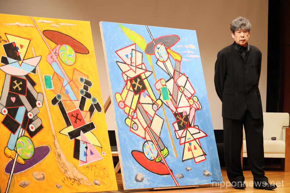 April 20, 2023, Tokyo, Japan - Japanese illustrator and artist Tadanori Yokoo poses before his paintings at a press conference at the Tokyo National Museum for his one-man exhibition "100 Takes on Hanshan and Shide" in Tokyo on Thursday, April 20, 2023. He will exhibit 101 pictures featuring Hanshan and Shide from September 12 through December 3. (photo by Yoshio Tsunoda/AFLO)
