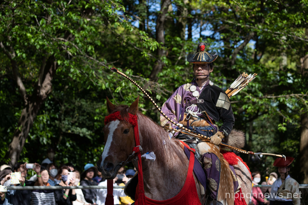 Yabusame (Japanese horseback archery) archer enters the competition arena before the start of the event on his horse during 65th Kamakura Festival on April 16, 2023 in Tsurugaoka Hachimangu Shrine in Kamakura, Japan. (Photo by Stanislav Kogiku/AFLO)