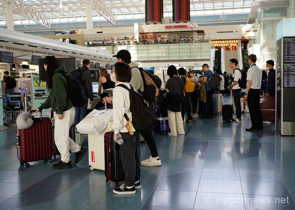 April 29, 2023, Tokyo, Japan - A crowd of travelers gathers at Tokyo International Airport as the Golden Week holidays kick off after the Japanese government ends COVID-19 border control measures in Tokyo, Japan on April 29, 2023. (Photo by AFLO)