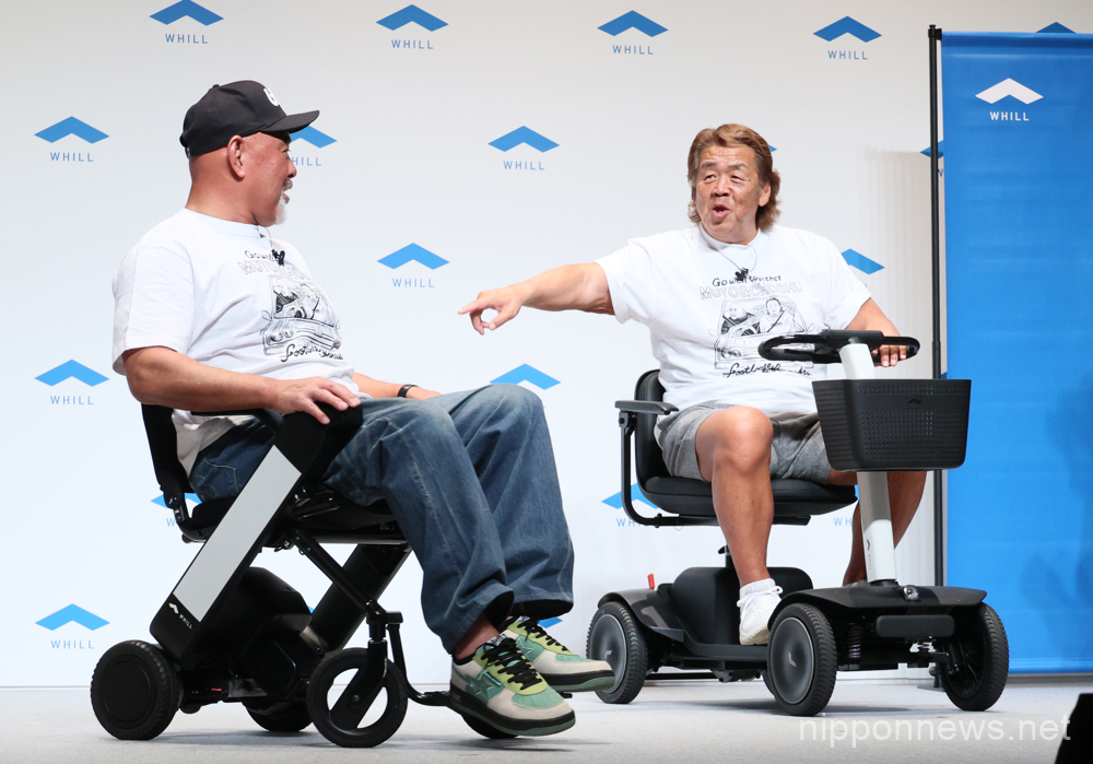 May 11, 2023, Tokyo, Japan - Former professional wrestlers Muto Keiji (L) and Choshu Riki (R) ride personal mobilities "Whill model F" (L) and "Whill model S" (R) as they attend a promotional event of personal mobility Whill in Tokyo on Thursday, May 11, 2023. Personal mobility company Whill announced to agree dealership with 100 car dealers across Japan to provide service and maintenance for the mobility. (photo by Yoshio Tsunoda/AFLO)