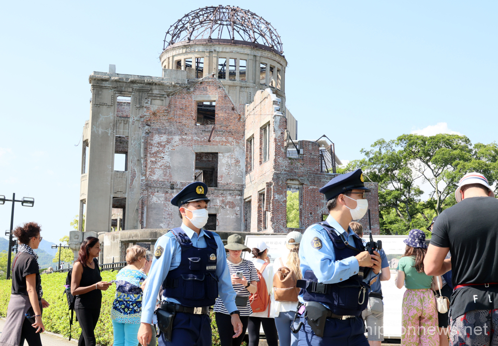 May 15, 2023, Hiroshima, Japan - Police officers patrol around the World's Heritage A-bomb Dome for security of the upcoming G7 summit meeting at the Peace Memorial Park in Hiroshima, western Japan on Monday, May 15, 2023. G7 leaders will gather for the annual summit meeting in Hiroshima from 19 through 21. (photo by Yoshio Tsunoda/AFLO)