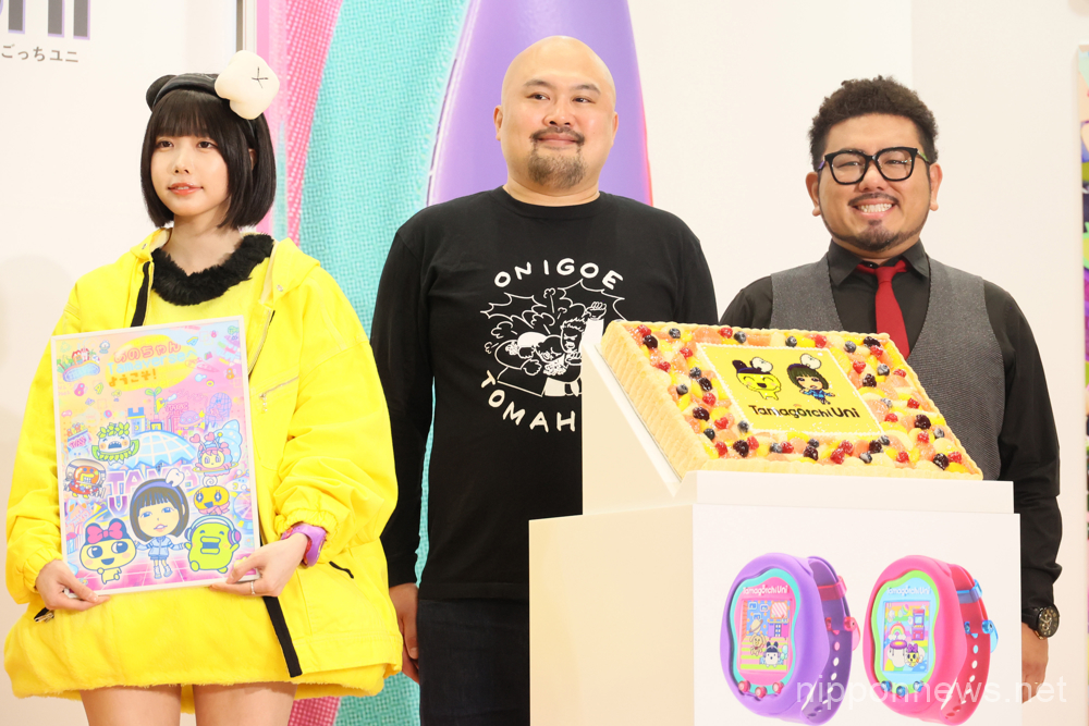 June 8, 2023, Tokyo, Japan - Japanese model Ano (L) and comedy duo Onigoe Tomahawk members Ryota Sakai (C) and Kinchan (R) pose for photo as they attend a promotional event of Japanese toy maker Bandai's egg shaped virtual pet game "Tamagotchi Uni" at the annual Tokyo Toy Show in Tokyo on Thursday, June 8, 2023. Some 150 Japanese and foreign toy makers exhibit their latest products at a four-day exhibition. (photo by Yoshio Tsunoda/AFLO)