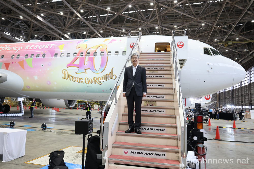 June 9, 2023, Tokyo, Japan - Japan Airlines (JAL) president Yuji Akasaka smiles as he inspected the inside of the "JAL Colorful Dreams Express" jetliner to celebrate the Disneyland's 40th anniversary at a JAL hangar at the Haneda airport in Tokyo on Friday, June 9, 2023. The new Disney characters designed Boeing 767 launched JAL's domestic routes. (photo by Yoshio Tsunoda/AFLO)